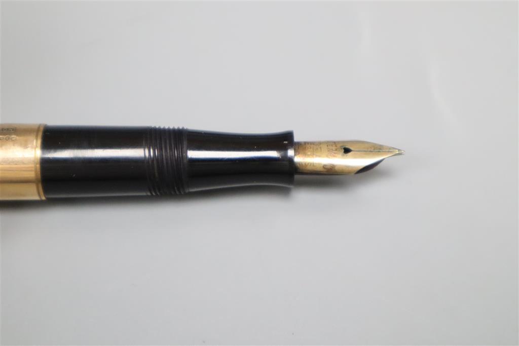 A 9ct gold mounted Watermans fountain pen together with a similar pencil